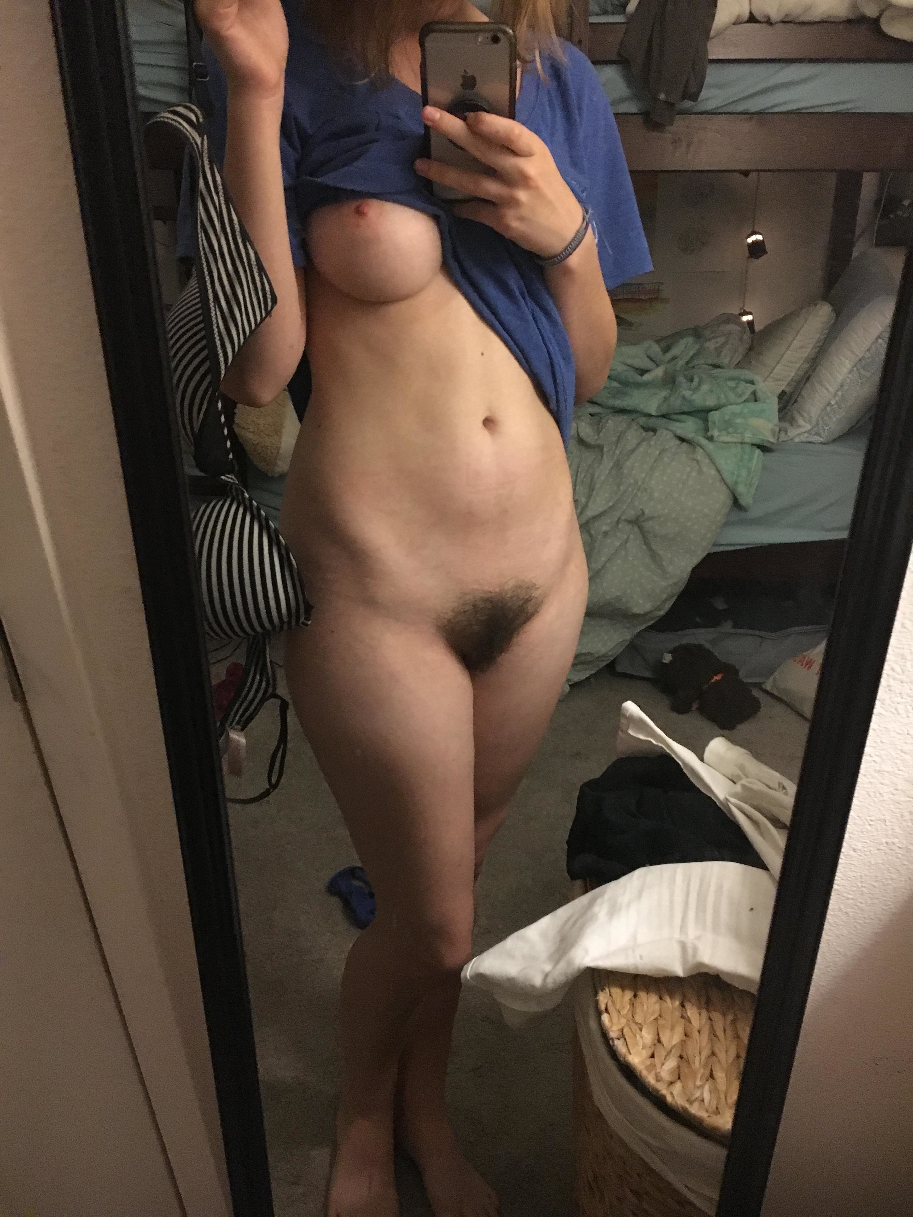 Photos - Appetizing Brunette Shows Hairy Pussy In Front Of The Mirror